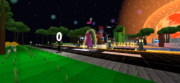Wide night view of a Downtown boulevard with green lawn and trees under a large orange planet